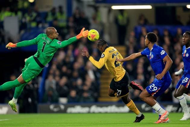 Chelsea goalkeeper Robert Sanchez saves the ball from Jean-Ricner Bellegarde of Wolverhampton Wanderers Chelsea v Wolverhampton Wanderers, Premier League, Football, Stamford Bridge, London, UK - 08 Nov 2025London Stamford Bridge United Kingdom EDITORIAL USE ONLY No use with unauthorised audio, video, data, fixture lists, club league logos or live services. Online in-match use limited to 120 images, no video emulation. No use in betting, games or single club league player publications. Copyright: xGeorgexTewkesbury Shutterstockx 15702174z