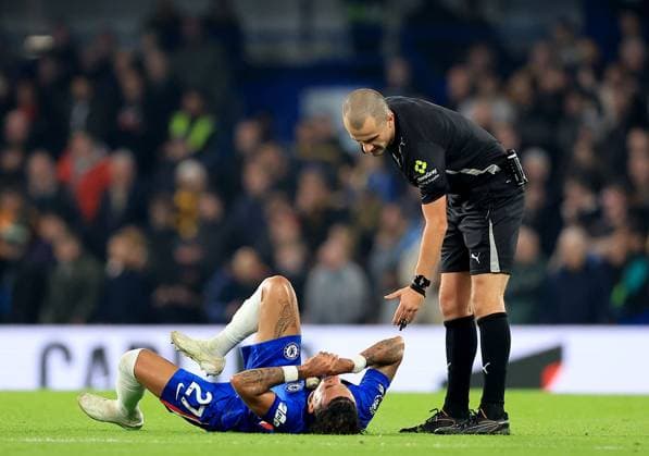 Malo Gusto of Chelsea is check on by referee Andrew Kitchen Chelsea v Wolverhampton Wanderers, Premier League, Football, Stamford Bridge, London, UK - 08 Nov 2025London Stamford Bridge United Kingdom EDITORIAL USE ONLY No use with unauthorised audio, video, data, fixture lists, club league logos or live services. Online in-match use limited to 120 images, no video emulation. No use in betting, games or single club league player publications. Copyright: xGeorgexTewkesbury Shutterstockx 15702174ao