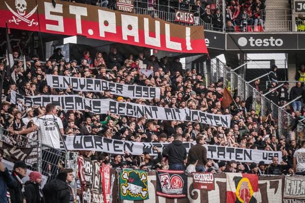 Germany, Freiburg, Europe, Soccer Bundesliga 2025 26, Matchday 10 SC Freiburg vs FC St Pauli, Europa Park Stadion, Guest block, FC St Pauli fans, Banner 9 November 1938, Fascism begins with words, Culture of remembrance, Anti-fascism, Fan culture, Commitment, Solidarity, Bundesliga Freiburg im Breisgau Baden Württemberg Germany Copyright: xJOERANxSTEINSIEKx