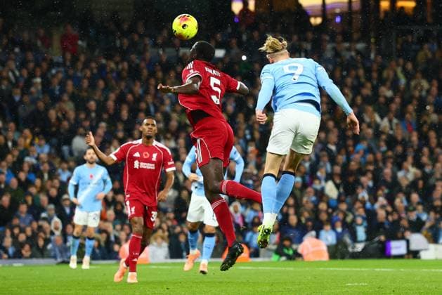 Erling Haaland of Manchester City scores to make it 1-0 and celebrates Manchester City v Liverpool, Premier League, Football, Etihad Stadium, Manchester, UK - 09 Nov 2025Manchester Etihad Stadium United Kingdom EDITORIAL USE ONLY No use with unauthorised audio, video, data, fixture lists, club league logos or live services. Online in-match use limited to 120 images, no video emulation. No use in betting, games or single club league player publications. Copyright: xPaulxCurrie Shutterstockx 15702266ak