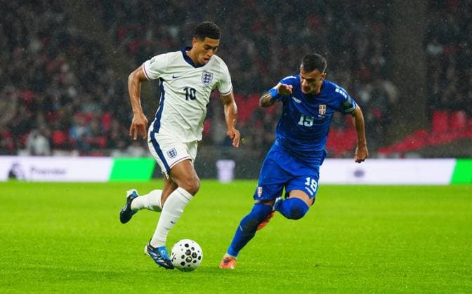 Jude Bellingham of England and Aleksandar Stankovic of Serbia England v Serbia, FIFA 2026 World Cup Qualifying, Group K, Football, Wembley Stadium, London, UK - 13 Nov 2025London Wembley Stadium United Kingdom EDITORIAL USE ONLY No use with unauthorised audio, video, data, fixture lists, club league logos or live services. Online in-match use limited to 120 images, no video emulation. No use in betting, games or single club league player publications. Copyright: xJavierxGarcia Shutterstockx 15759347er