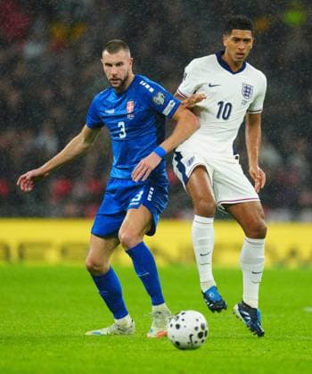 Jude Bellingham of England and Strahinja Pavlovic of Serbia England v Serbia, FIFA 2026 World Cup Qualifying, Group K, Football, Wembley Stadium, London, UK - 13 Nov 2025London Wembley Stadium United Kingdom EDITORIAL USE ONLY No use with unauthorised audio, video, data, fixture lists, club league logos or live services. Online in-match use limited to 120 images, no video emulation. No use in betting, games or single club league player publications. Copyright: xJavierxGarcia Shutterstockx 15759347do