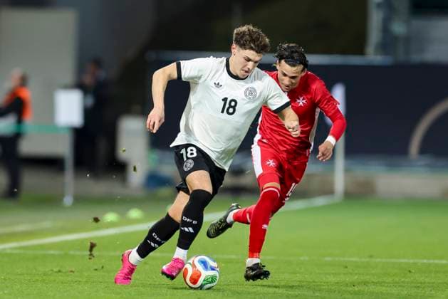Mert Koemuer Germany and Benjamin Hili Malta battle for the ball, UEFA Under21 Championship Group F MD 6, Germany U21 v Malta U21, Sportpark Ronhof Thomas Sommer, November 14, 2025 in Furth, Germany Photo by Marco Steinbrenner DeFodi Images Mert Koemuer Germany and Benjamin Hili Malta battle for the ball, UEFA Under21 Championship Group F MD 6, Germany U21 v Malta U21, Sportpark Ronhof Thomas Sommer, November 14, 2025 in Furth, Germany Photo by Marco Steinbrenner DeFodi Images DFB DFL REGULATIONS PROHIBIT ANY USE OF PHOTOGRAPHS AS IMAGE SEQUENCES AND OR QUASI VIDEO
