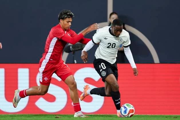 Keyon Ewurum Malta and Ilyas Ansah Germany battle for the ball, UEFA Under21 Championship Group F MD 6, Germany U21 v Malta U21, Sportpark Ronhof Thomas Sommer, November 14, 2025 in Furth, Germany Photo by Marco Steinbrenner DeFodi Images Keyon Ewurum Malta and Ilyas Ansah Germany battle for the ball, UEFA Under21 Championship Group F MD 6, Germany U21 v Malta U21, Sportpark Ronhof Thomas Sommer, November 14, 2025 in Furth, Germany Photo by Marco Steinbrenner DeFodi Images DFB DFL REGULATIONS PROHIBIT ANY USE OF PHOTOGRAPHS AS IMAGE SEQUENCES AND OR QUASI VIDEO
