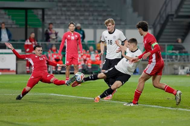 From left to right Benjamin Hill Malta, 19 and Nicolo Tresoldi Germany, 9 , November 14, 2025, Football, U21 European Championship Qualification, Germany Malta, GER, Fuerth, Sportpark Ronhof Copyright: HMBxMedia xHeikoxBecker