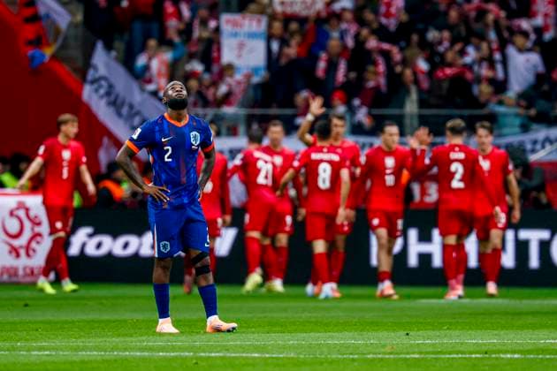 Lutsharel Geertruida of the Netherlands looks dejected after conceding his sides first goal Poland v Netherlands, FIFA World Cup, WM, Weltmeisterschaft, Fussball 2026 Qualifier, Poland v Netherlands, PGE Narodowy, November 14, 2025, Warsaw, Poland.