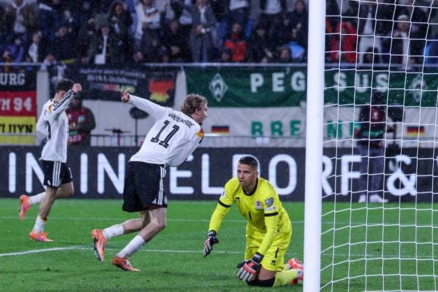 Goalscorer Nick Woltemade 11 Germany and Florian Wirtz 17 Germany celebrate after the 0 1, with Anthony Morris 1 Luxembourg Luxembourg , Luxembourg vs Germany, Football, Men, World Cup Qualification, Group match, Group stage, Group A, Stade de Luxembourg, UEFA,14 11 2025 Luxembourg City Luxembourg Copyright: xkolbert-press MartinxAgüerax