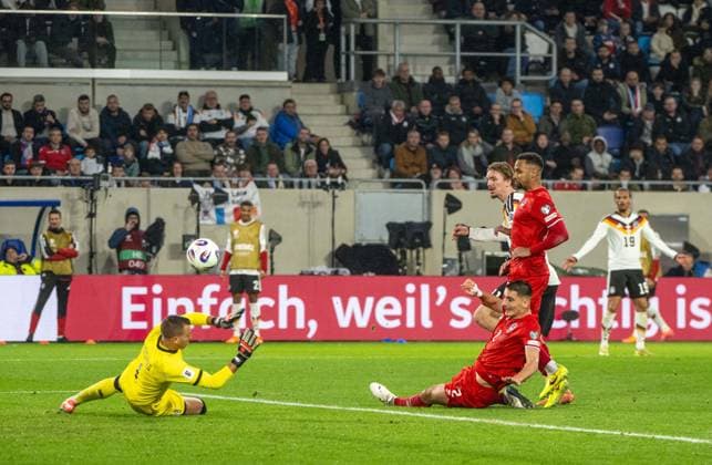 Soccer, Men, Season 2025 26, World Cup Qualification Group A, Matchday 9 , Luxembourg Germany, f l Goalkeeper Anthony Moris Luxembourg , Seid Korac Luxembourg , Nick Woltemade Germany scores the goal to 2 0, Marvin Martins Luxembourg , 14 11 2025, Copyright: xMatthiasxKochx
