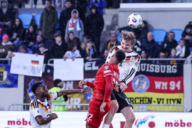 Nick Woltemade 11 Germany with a header against Marvin Martins 22 Luxembourg Luxembourg , Ridle Baku Germany watches, Luxembourg vs Germany, Football, Men, World Cup Qualification, Country Match, Group Stage, Group A, Stade de Luxembourg, UEFA,14 11 2025 Luxembourg City Luxembourg Copyright: xkolbert-press MartinxAgüerax