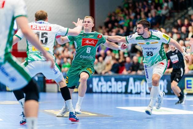 v l Adam Loenn SC DHfK Leipzig, 15 , Karolis Antanavicius GWD Minden, 08 , Luka Rogan SC DHfK Leipzig, 33 GER, GWD Minden vs SC DHfK Leipzig, Handball, 1 Bundesliga, Matchday 12, Season 2025 2026, 14 11 2025 GER, GWD Minden vs SC DHfK Leipzig, Handball, 1 Bundesliga, Matchday 12, Season 2025 2026, 14 11 2025 Luebbecke Copyright: xEibner-Pressefoto JanxRollingerx EP_JSK
