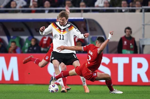 . - Luxembourg v Germany, FIFA World Cup, WM, Weltmeisterschaft, Fussball Qualifier, Group A, Stade de Luxembourg, Luxembourg. - 14th November 2025. (C) Daniel Weir Crystal Pix Nick Woltemade of Germany national team, Nationalteam battles for the ball with Seid Korac of Luxembourg national team. - Luxembourg v Germany, FIFA World Cup Qualifier, Group A, Stade de Luxembourg, Luxembourg. - 14th November 2025. (C) Daniel Weir Crystal Pix Luxembourg Stade de Luxembourg Luxembourg Copyright: xDanielxWeirx CP_Luxembourg_Germany_141125_DW64