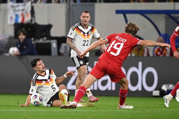 from l Alexandar PAVLOVIC GER , David RAUM GER and Mathias OLESEN LUX action, duel, Luxembourg LUX Germany GER 0 2 Soccer international, World Cup Qualification Europe Group A, matchday 9, matchday9, on 14 1 2025, Stade de Luxembourg, Luxembourg, Â