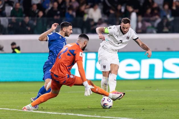 SOCCER - FIFA WC quali, CYP vs AUT LIMASSOL,CYPRUS,15.NOV.25 - SOCCER - FIFA World Cup, WM, Weltmeisterschaft, Fussball 2026, European Qualifiers, group stage, OEFB international match, Länderspiel, Nationalmannschaft Cyprus vs Austria. Image shows Nikolaos Panagiotou, Fabiano (CYP) and Marko Arnautovic (AUT). Keywords: goal. GEPAxpictures xArminxRauthner