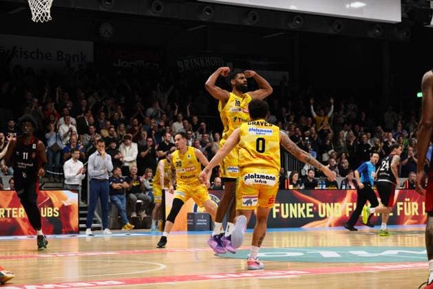 ProA Phoenix Hagen vs Bayer Giants Leverkusen, Hagen, 15 11 2025, Ischelandhalle Hagen Lucas NGuessan Phoenix Hagen, 19, Center celebrates the successful point With Marcus Graves Phoenix Hagen, 0, Guard In the background Jeffrey Carroll Phoenix Hagen, 30, Forward ProA Phoenix Hagen vs Bayer Giants Leverkusen, Hagen, 15 11 2025, Ischelandhalle Hagen Copyright: xBEAUTIFULxSPORTS Piepenstockx