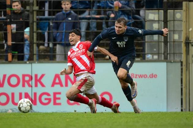 SV Babelsberg 03 FC Energie Cottbus, State Cup, Quarter-final, Season 25 26, Football, 15 11 2025, Potsdam, Photo Benjamin Feller c17 l Cottbus , Nils Schätzle r Babelsberg , SV Babelsberg 03 FC Energie Cottbus, State Cup Brandenburg, Quarter-final, Season 25 26, Football, 15 11 2025, Potsdam Potsdam Karl Liebknecht Stadion Brandenburg Deutschalnd Copyright: xBenjaminxFellerx
