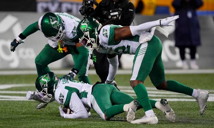 November 16, 2025, Winnipeg, Mb, CANADA: Saskatchewan Roughriders Marcus Sayles (8), bottom, celebrates with teammates after recovering a fumble from Montreal Alouettes Shea Patterson (7) during second half CFL football action at the 112th Grey Cup, in Winnipeg on Sunday, Nov. 16, 2025. Canada News - November 16, 2025 - ZUMAc35_ 20251116_zaf_c35_132 Copyright: xFrankxGunnx