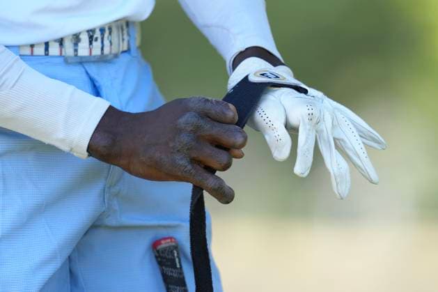 Cape Town Disabled Golf Open 2025 in Cape Town, South Africa Issa Nlareb A Amang from Cameroon straps the club to his one arm during the Cape Town Disabled Golf Open 2025 in Cape Town, South Africa, on November 17, 2025. The Cape Town Disabled Golf Open celebrates inclusion, ability, and the remarkable talent of golfers with disabilities a true showcase of determination and community spirit. It is one of the top disabled golf tournaments in the world with an international field of competitors. People suffering from any number of physical disabilities including arm and leg amputees, hemiplegics, paraplegics, stroke victims, Les Autres, blind and deaf people that are able to grip the club with at least one hand and hit the ball can compete. Cape Town South Africa Copyright: xMatrixxImagesx xNicxBothmax