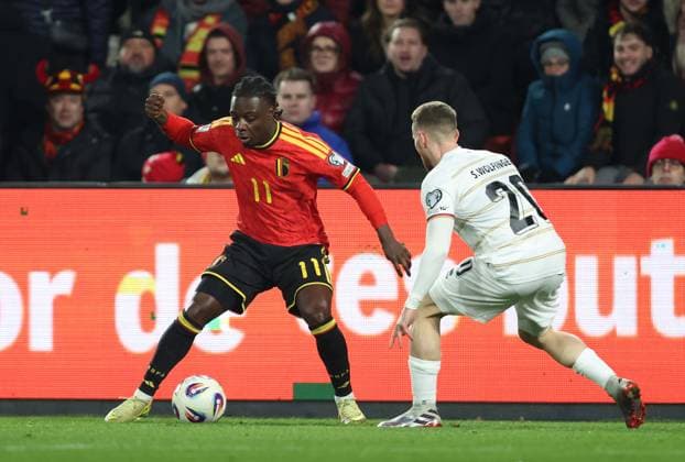 . - Belgium v Liechtenstein, FIFA World Cup, WM, Weltmeisterschaft, Fussball 2026 Qualifying, League Phase, Group J, Stade Maurice Dufrasne, Liege, Belgium. - 18th November 2025. (C) Daniel Weir Crystal Pix Jeremy Doku of Belgium national teambattles for the ball with Sandro Wolfinger of Liechtenstein national team, Nationalteam - Belgium v Liechtenstein, FIFA World Cup 2026 Qualifying, League Phase, Group J, Stade Maurice Dufrasne, Liege, Belgium. - 18th November 2025. (C) Daniel Weir Crystal Pix Liege Stade Maurice Dufrasne Belgium Copyright: xDanxWeirx CP_Belgium_Liechtenstein_25