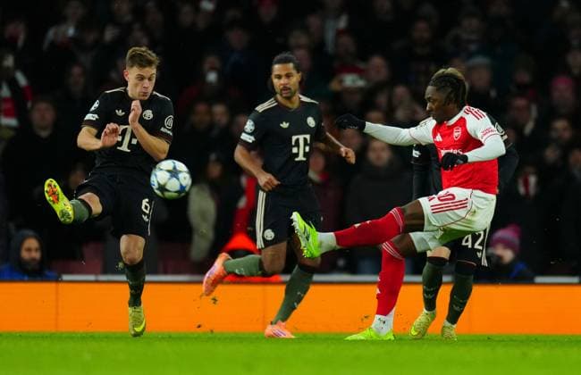 Eberechi Eze of Arsenal crosses past Joshua Kimmich of Bayern Munich Arsenal v Bayern Munich, UEFA Champions League, Group Stage, Football, Emirates Stadium, London, UK- 26 Nov 2025London Emirates Stadium United Kingdom EDITORIAL USE ONLY No use with unauthorised audio, video, data, fixture lists, club league logos or live services. Online in-match use limited to 120 images, no video emulation. No use in betting, games or single club league player publications. Copyright: xJavierxGarcia Shutterstockx 15927947cu