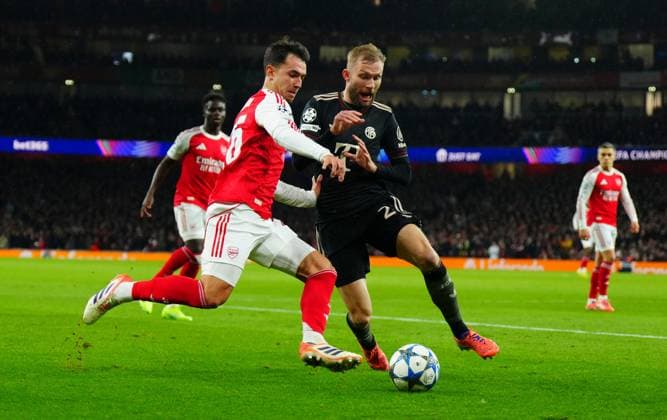 Martin Zubimendi of Arsenal battles with Konrad Laimer of Bayern Munich Arsenal v Bayern Munich, UEFA Champions League, Group Stage, Football, Emirates Stadium, London, UK- 26 Nov 2025London Emirates Stadium United Kingdom EDITORIAL USE ONLY No use with unauthorised audio, video, data, fixture lists, club league logos or live services. Online in-match use limited to 120 images, no video emulation. No use in betting, games or single club league player publications. Copyright: xJavierxGarcia Shutterstockx 15927947cc