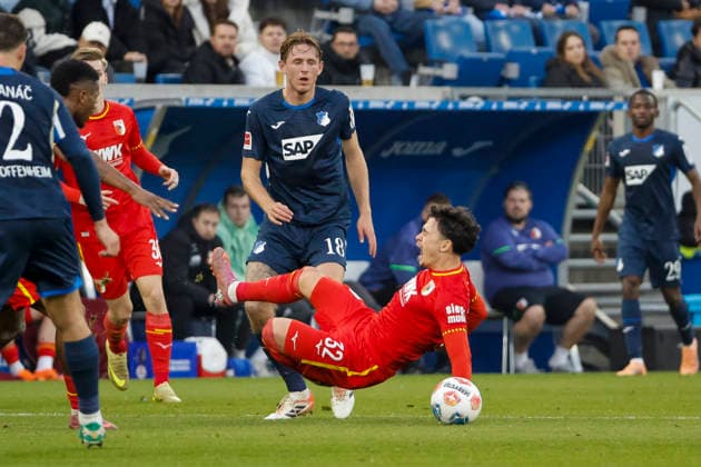 Wouter Burger TSG Hoffenheim, 18 and Fabian Rieder FC Augsburg, 32 in duel , Germany, Soccer, 1 Bundesliga, Matchday 12, 2025 2026, TSG Hoffenheim vs FC Augsburg, 29 11 2025, PreZero Arena, Sinsheim, Germany Sinsheim PreZero Arena Baden Württemberg Germany Copyright: xGrantxHubbsx