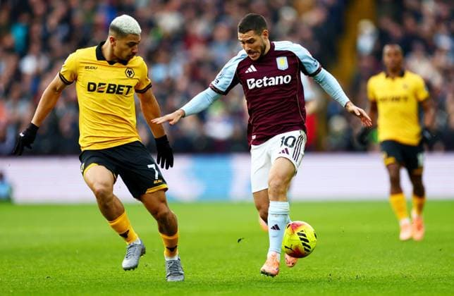 Emi Buend?a of Aston Villan and Andre of Wolverhampton Wanderers. Aston Villa v Wolverhampton Wanderers, Premier League, Football, Villa Park, Birmingham, UK - 30 Nov 2025Birmingham Villa Park United Kingdom EDITORIAL USE ONLY No use with unauthorised audio, video, data, fixture lists, club league logos or live services. Online in-match use limited to 120 images, no video emulation. No use in betting, games or single club league player publications. Copyright: xJamesxMarsh Shutterstockx 15941716ai