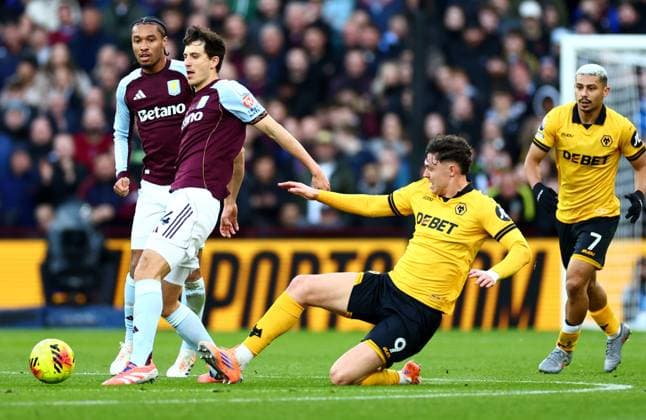 Pau Torres of Aston Villa and Jorgen Strand Larsen of Wolverhampton Wanderers Aston Villa v Wolverhampton Wanderers, Premier League, Football, Villa Park, Birmingham, UK - 30 Nov 2025Birmingham Villa Park United Kingdom EDITORIAL USE ONLY No use with unauthorised audio, video, data, fixture lists, club league logos or live services. Online in-match use limited to 120 images, no video emulation. No use in betting, games or single club league player publications. Copyright: xJamesxMarsh Shutterstockx 15941716al