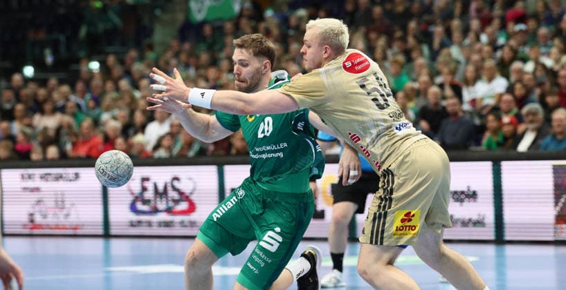 Leipzig, 30 11 2025, Arena Leipzig, Handball, Bundesliga, Matchday 14 , SC DHfK Leipzig vs TSV Hannover Burgdorf, In the picture from left William Bogojevic 20, Leipzig , Justus Fischer 54, Hannover , For editorial use only Only editorial use , DHB HBL regulations prohibit any use of photographs as image sequences and or quasi video ,