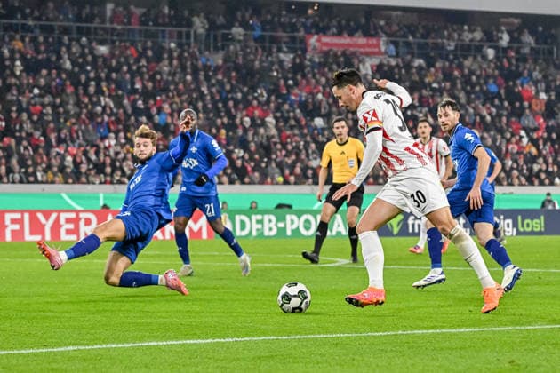 Christian Guenter SC Freiburg, 30 on the ball and in front of Killian Corredor SV Darmstadt 98, 34 GER, SC Freiburg SV Darmstadt 98, Football, DFB Pokal, Round of 16, 2025 2026 season, 03 12 2025 DFB REGULATIONS PROHIBIT ANY USE OF PHOTOGRAPHS AS IMAGE SEQUENCES AND OR QUASI VIDEO GER, SC Freiburg SV Darmstadt 98, Football, DFB Pokal, Round of 16, 2025 2026 season, 03 12 2025 Freiburg Copyright: xEibner-Pressefoto ThomasxHessx EP_THS