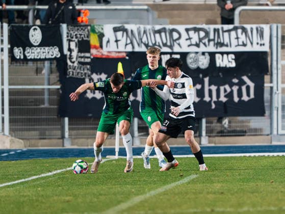 Aleksandar Kandic FC Guetersloh, 27 in duel against Emirhan Hacioglu SG Wattenscheid 09, 21 SG Wattenscheid 09 vs FC Guetersloh, Football, Westphalia State Cup, quarter-final, 2025 2026 season, 03 12 2025 SG Wattenscheid 09 vs FC Guetersloh, Football, Westphalia State Cup, quarter-final, 2025 2026 season, 03 12 2025 Wattenscheid Copyright: xEibner-Pressefoto DamianxKruczynx EP_DKI
