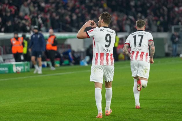Lucas Hoeler Lucas Hoeler SC Freiburg, 09 goal celebration, emotions, goal shot, goal, goal success, goal, hit, heart, soccer, round of 16, DFB Pokal, 2025 26, SC Freiburg vs SV Darmstadt 98, 03 12 2025, Europa Park Stadion, Freiburg, Germany DFB REGULATIONS PROHIBIT ANY USE OF PHOTOGRAPHS AS IMAGE SEQUENCES AND OR QUASI VIDEO Freiburg Europa Park Stadion Baden Württemberg Germany Copyright: xArnexAmbergx