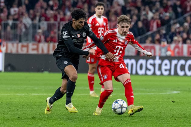 Fight for the ball duel between Joao Simoes Sporting Lisbon, 52 and Lennart Karl FC Bayern Muenchen, 42 GER, FC Bayern Muenchen vs Sporting Lisbon SCP, Football, Champions League, League Phase 6 Matchday, Season 2025 2026, 09 12 2025 DFL DFB REGULATIONS PROHIBIT ANY USE OF PHOTOGRAPHS as IMAGE SEQUENCES and or QUASI VIDEO GER, FC Bayern Muenchen vs Sporting Lisbon SCP, Football, Champions League, League Phase 6 Matchday, Season 2025 2026, 09 12 2025 Muenchen Copyright: xEibner-Pressefoto HeikexFeinerx EP_HFR