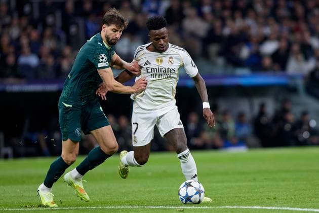Vinicius Jr of Real Madrid CF and Ruben Dias of Manchester City FC Real Madrid v Manchester City, UEFA Champions League, Football, Estadio Santiago Bernabeu, Madrid, Spain - 10 Dec 2025Madrid Estadio Santiago Bernabu Spain EDITORIAL USE ONLY No use with unauthorised audio, video, data, fixture lists, club league logos or live services. Online in-match use limited to 120 images, no video emulation. No use in betting, games or single club league player publications. Copyright: xRubenxAlbarran Shutterstockx 16073023z