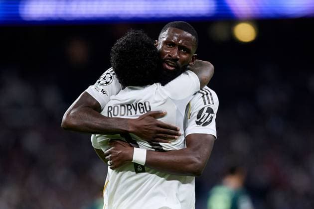 Rodrygo Goes of Real Madrid CF celebrates after scoring a goal with Antonio Rudiger of Real Madrid CF Real Madrid v Manchester City, UEFA Champions League, Football, Estadio Santiago Bernabeu, Madrid, Spain - 10 Dec 2025Madrid Estadio Santiago Bernabu Spain EDITORIAL USE ONLY No use with unauthorised audio, video, data, fixture lists, club league logos or live services. Online in-match use limited to 120 images, no video emulation. No use in betting, games or single club league player publications. Copyright: xRubenxAlbarran Shutterstockx 16073023aw