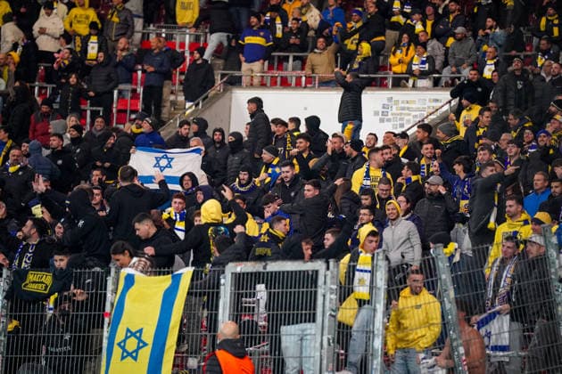 Football UEFA Europa League 2025 26, Matchday 6 VfB Stuttgart vs Maccabi Tel Aviv FC Arena Stuttgart Germany Stuttgart, Germany, Europe, Maccabi guest block, Israel flags, yellow blue fan wall, away mob, fan chants, stadium atmosphere, security, UEFA Europa League, international match, symbolic photo of lively away support Copyright: xJOERANxSTEINSIEKx