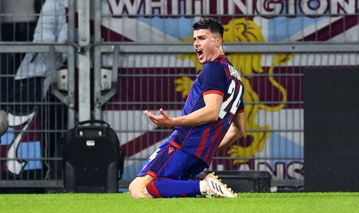 Flavius Daniliuc of Basel celebrates scoring a goal after making the score 1-1. FC Basel v Aston Villa, UEFA Europa League, Group Stage, Football, St. Jakob-Park, Basel, Switzerland - 11 Dec 2025Basel St. Jakob-Park Switzerland EDITORIAL USE ONLY No use with unauthorised audio, video, data, fixture lists, club league logos or live services. Online in-match use limited to 120 images, no video emulation. No use in betting, games or single club league player publications. Copyright: xJamesxMarsh Shutterstockx 16080606bh