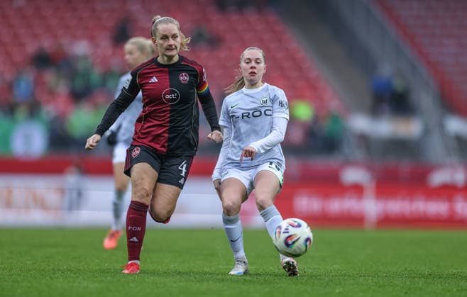GER, Nuremberg, 1 FC Nuremberg vs VfL Wolfsburg, Google Pixel Bundesliga, Soccer, DFB, Season 2025 2026, Max Morlock Stadium, 13 Matchday in picture f l Luisa Guttenberger 1 FC Nuremberg Women 4 , Janou Levels VfL Wolfsburg 15 DFB DFL REGULATIONS PROHIBIT ANY USE OF PHOTOGRAPHS AS IMAGE SEQUENCES AND OR QUASI VIDEO, 13 12 2025 Copyright: HMBxMedia HendrikxHamelau