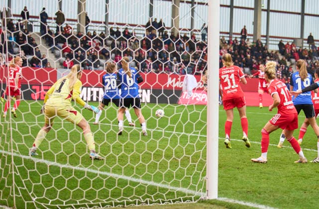 Klara Bühl of Bayern München scores, shoots goal , Tor, Treffer, Torschuss, 3-0 against Inga Schuldt of HSV in the women football match FC BAYERN MÜNCHEN - HAMBURGER SV on December 14, 2025 in Munich, Germany. Season 2025 2026, 1.Bundesliga, FCB, Muenchen, Google Pixel, Frauen Bundesliga matchday 13, 13.Spieltag