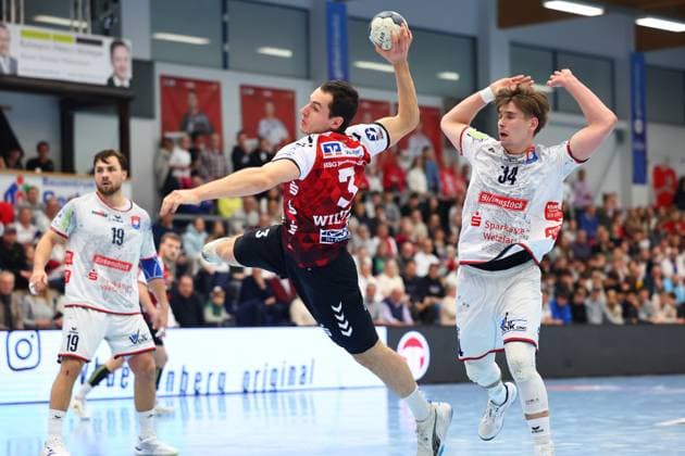 Goal throw by Christian Wilhelm HSG Nordhorn Lingen, 03 GER, TV Huettenberg vs HSG Nordhorn Lingen, 2 Handball Bundesliga, Matchday 15, Season 2025 2026, 14 12 2025 GER, TV Huettenberg vs HSG Nordhorn Lingen, 2 Handball Bundesliga, Matchday 15, Season 2025 2026, 14 12 2025 Huettenberg Copyright: xEibner-Pressefoto RenexWeissx EP_RWS