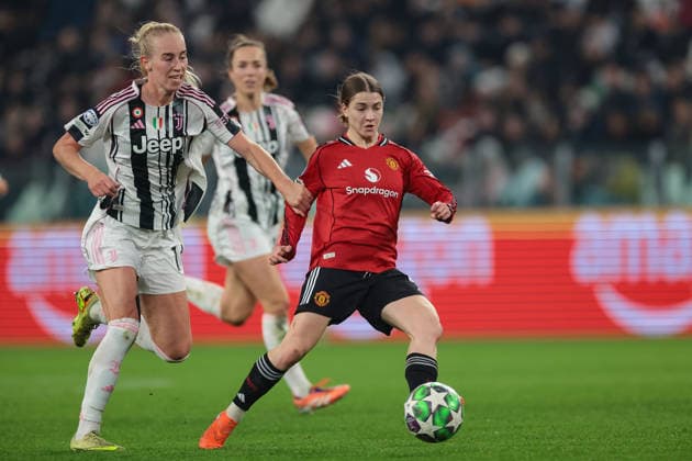 Turin, Italy, 17th December 2025. Jess Park of Manchester United, ManU passes the ball as she is pursued by Amalie Jorgensen Vangsgaard of Juventus during the Juventus Women vs Manchester United Women UEFA Womens Champions League match at Juventus Stadium, Turin. Picture credit should read: Jonathan Moscrop Sportimage EDITORIAL USE ONLY. No use with unauthorised audio, video, data, fixture lists, club league logos or live services. Online in-match use limited to 120 images, no video emulation. No use in betting, games or single club league player publications. SPI_035_JM_JUVE_MANUTD_UWCL SPI-4364-0035