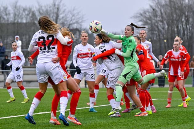 Penalty scene Sophie Klein Goalkeeper, Goalkeeper, FCB, 1 fists the ball in front of Rosa Rückert Stuttgart, 11 away, 21 12 2025, Munich Germany , Football,2 Women Bundesliga, FC Bayern München II VfB Stuttgart, DFB DFL REGULATIONS PROHIBIT ANY USE OF PHOTOGRAPHS AS IMAGE SEQUENCES AND OR QUASI VIDEO xslx