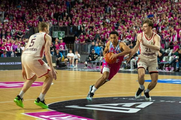 Niels Giffey, Forward, FC Bayern Basketball 5 , Justus Hollatz, Guard, FC Bayern Basketball 21 , Joel Aminu, Shooting Guard, Telekom Baskets Bonn 21 , , Telekom Baskets Bonn vs FC Bayern Basketball, Basketball, BBL, 31 Matchday, 21 12 2025 Cologne North Rhine-Westphalia Germany Copyright: xkolbert-press MartinxWdziecznyx