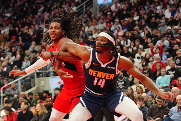 December 31, 2025, Toronto, On, CANADA: Toronto Raptors forward Collin Murray-Boyles, left, and Denver Nuggets forward Daron Holmes II (14) battle for position after a free-throw during second half NBA, Basketball Herren, USA action in Toronto on Wednesday December 31, 2025. Canada News - December 31, 2025 - ZUMAc35_ 20251231_zaf_c35_058 Copyright: xFrankxGunnx