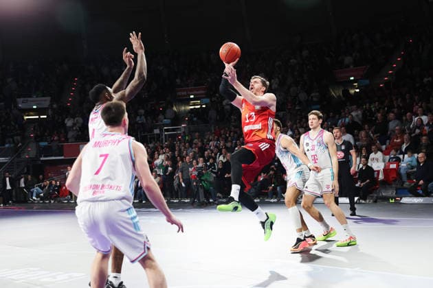 Andreas Obst FC Bayern Basketball, 13 with ball in the air with Patrick Heckmann Telekom Baskets Bonn, 33 and Grayson Murphy Telekom Baskets Bonn, 07 and Jeff Garrett Jr Telekom Baskets Bonn, 04 , GER, FC Bayern Basketball vs Telekom Baskets Bonn, Basketball, easycredit Basketball Bundesliga, 15 Matchday, Season 2025 2026, 11 01 2026, GER, FC Bayern Basketball vs Telekom Baskets Bonn, Basketball, easycredit Basketball Bundesliga, 15 Matchday, Season 2025 2026, 11 01 2026 Muenchen Copyright: xEibner-Pressefoto JennixMaulx EP_JML