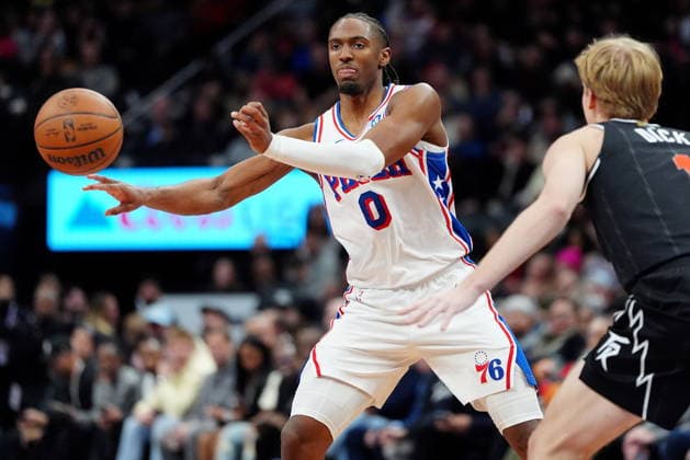 January 12, 2026, Toronto, On, CANADA: Toronto Raptors guard forward Gradey Dick (1) keeps his eye on Philadelphia 76ers guard Tyrese Maxey (0) as he makes a pass during second half NBA, Basketball Herren, USA basketball action in Toronto, Monday, Jan. 12, 2026. Canada News - January 12, 2026 - ZUMAc35_ 20260112_zaf_c35_086 Copyright: xFrankxGunnx