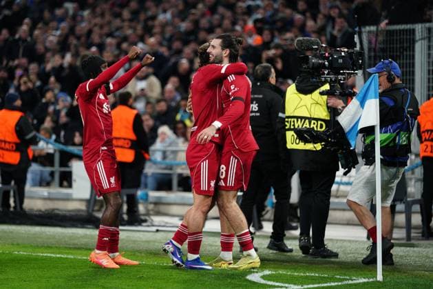 Dominik Szoboszlai of Liverpool is congratulated after putting his side 1-0 ahead Marseille v Liverpool, UEFA Champions League, Group Stage, Football, Orange Velodrome, Marseille, France - 21 Jan 2026Marseille Orange Vélodrome France EDITORIAL USE ONLY No use with unauthorised audio, video, data, fixture lists, club league logos or live services. Online in-match use limited to 120 images, no video emulation. No use in betting, games or single club league player publications. Copyright: xDavexWinter Shutterstockx 16348361fv