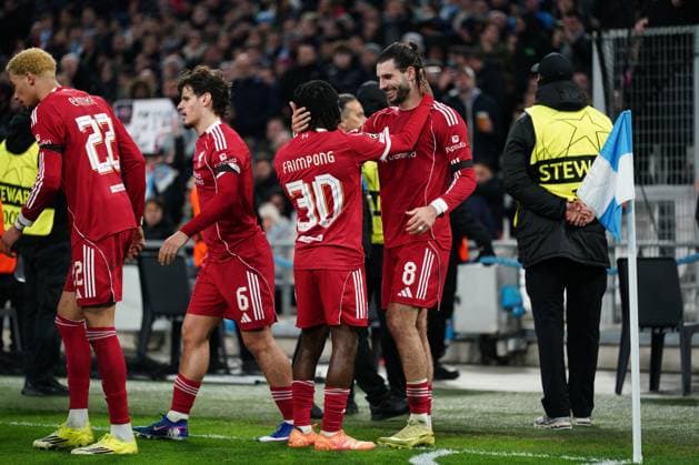 Dominik Szoboszlai of Liverpool is congratulated by Jeremie Frimpong of Liverpool after putting his side 1-0 ahead Marseille v Liverpool, UEFA Champions League, Group Stage, Football, Orange Velodrome, Marseille, France - 21 Jan 2026Marseille Orange Vélodrome France EDITORIAL USE ONLY No use with unauthorised audio, video, data, fixture lists, club league logos or live services. Online in-match use limited to 120 images, no video emulation. No use in betting, games or single club league player publications. Copyright: xDavexWinter Shutterstockx 16348361gl