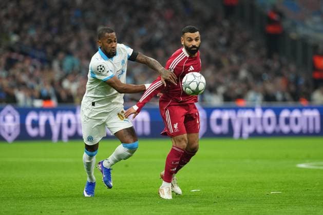 Mohamed Salah of Liverpool battles with Michael Murillo of Marseille Marseille v Liverpool, UEFA Champions League, Group Stage, Football, Orange Velodrome, Marseille, France - 21 Jan 2026Marseille Orange Vélodrome France EDITORIAL USE ONLY No use with unauthorised audio, video, data, fixture lists, club league logos or live services. Online in-match use limited to 120 images, no video emulation. No use in betting, games or single club league player publications. Copyright: xDavexWinter Shutterstockx 16348361il