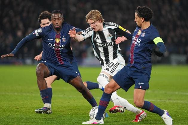Anthony Gordon of Newcastle takes on Willian Pacho of PSG and Marquinhos of PSG Paris Saint-Germain v Newcastle United, UEFA Champions League, Group Stage, Football, Parc des Princes, Paris, France - 28 Jan 2026Paris Parc des Princes France EDITORIAL USE ONLY No use with unauthorised audio, video, data, fixture lists, club league logos or live services. Online in-match use limited to 120 images, no video emulation. No use in betting, games or single club league player publications. Copyright: xDavexWinter Shutterstockx 16429499iz