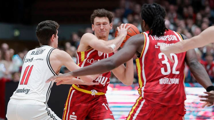 In the picture from left Richard Balint Bamberg Baskets, 11 , Brae Ivey Wuerzburg Baskets, 11 on the ball and Charles Thompson Wuerzburg Baskets, 32 01 02 2026, Fitness First Wuerzburg Baskets vs BMA365 Bamberg Baskets, easyCredit BBL, Matchday 18, Germany, 97072, tectake Arena Wuerzburg, Copyright: HMBxMedia xJulienxBecker